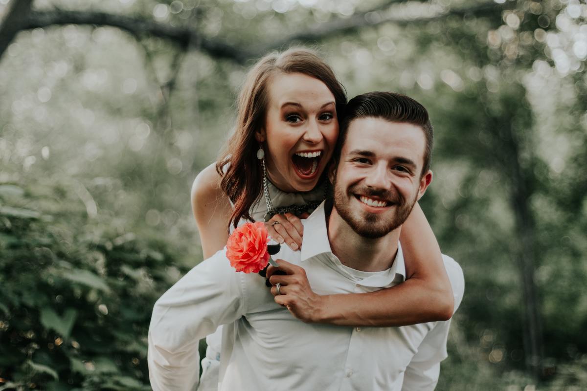 Happiest couple ever the woman get piggyback from the man